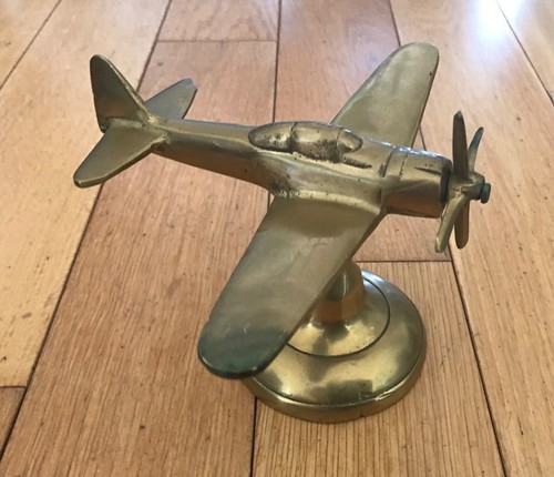 Vintage heavy brass airplane