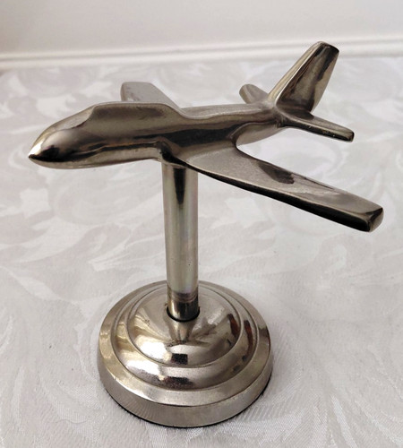 Chrome aeroplane model - aeroplane,
