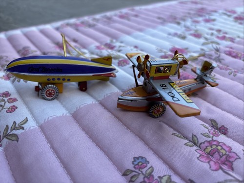 Pair vintage tin toy - of,