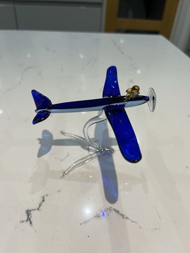 Hand blown glass aeroplane - hand,